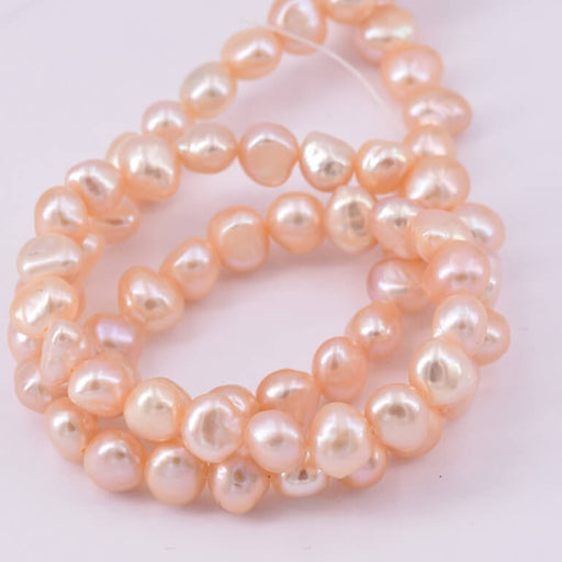 Buy Freshwater pearl nugget peach 6-6.5mm (1 strand-40cm)