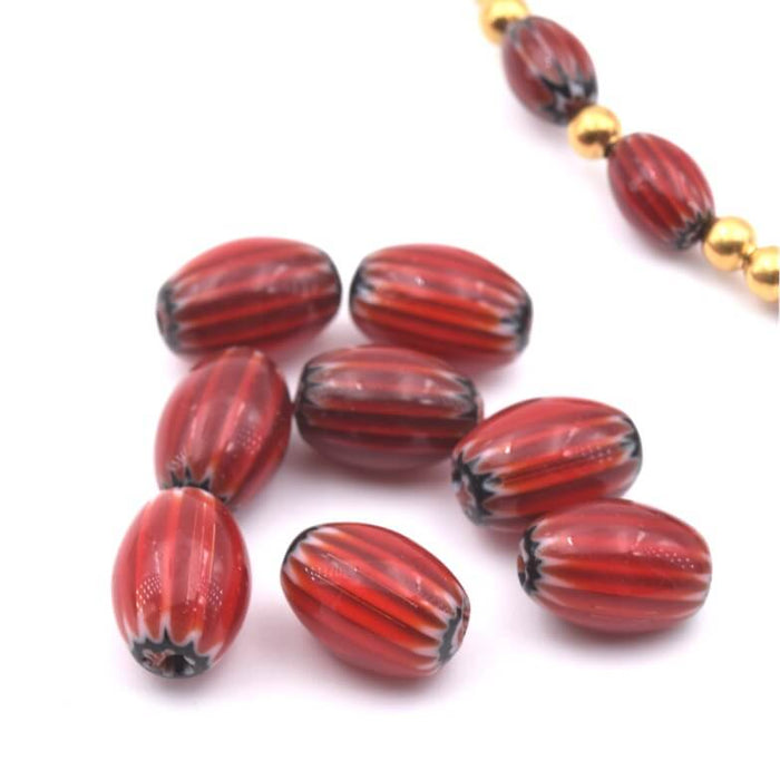 Millefiori red barrel tube beads rosetta 8.5-9x6-6.5mm - hole: 0.8mm. Rosetta chevron beads. Sold by 10 units