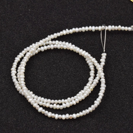 Buy White Potato Freshwater Pearl 1-1.5x2-2.5mm (1strand - 39cm)