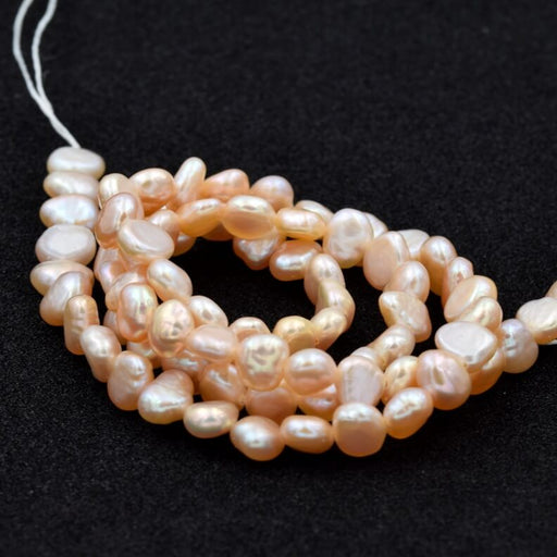 Freshwater pearl Flat potatoe powder pink - 5x6.5-7x3.5mm (1 strand - 40cm)