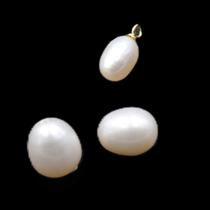 White oval freshwater pearls - half-drilled - 9x7mm - Hole: 0.9mm (2)