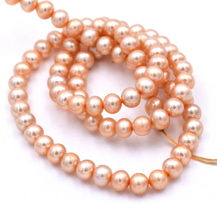 Freshwater pearl round potatoe champagne - 5x4mm - Hole: 0.6mm (1 Strand)