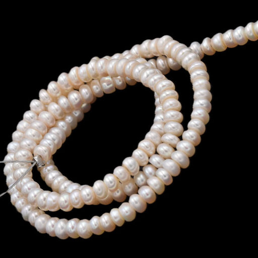 Freshwater pearl button rondelle white cream - 4x2mm - Hole: 0.5mm (1 Strand)