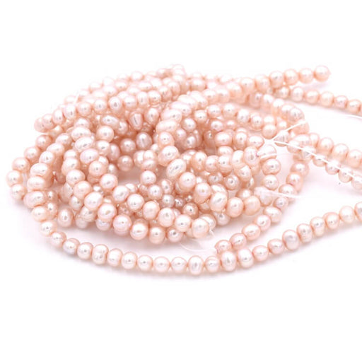 Freshwater pearl round potatoe silky beige - 4.5-5mm sur Strand (1)