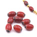 Millefiori red barrel tube beads rosetta 8.5-9x6-6.5mm - hole: 0.8mm. Rosetta chevron beads. Sold by 10 units