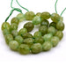 Oval tumbled olive green jade beads 10x12-14mm - Hole: 0.8mm (1 strand - 37cm)