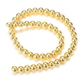 Buy Hematite synthetic golden round bead 4mm - Hole: 1mm (1 Strand-39cm)
