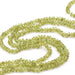 Peridot button bead 4-6x3-5mm - Hole: 0.5mm (1 Strand-33cm)