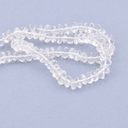 Quartz crystal button bead 5-6x3-4mm - Hole: 0.5mm (1 Strand-33cm)