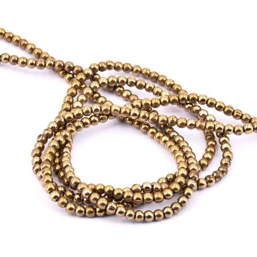 Buy Round glass bead 2mm bronze gold - Hole: 0.6mm (1 strand = 35cm)