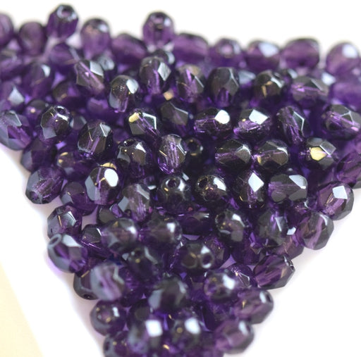 Buy Czech fire-polished beads tanzanite 4mm (100)